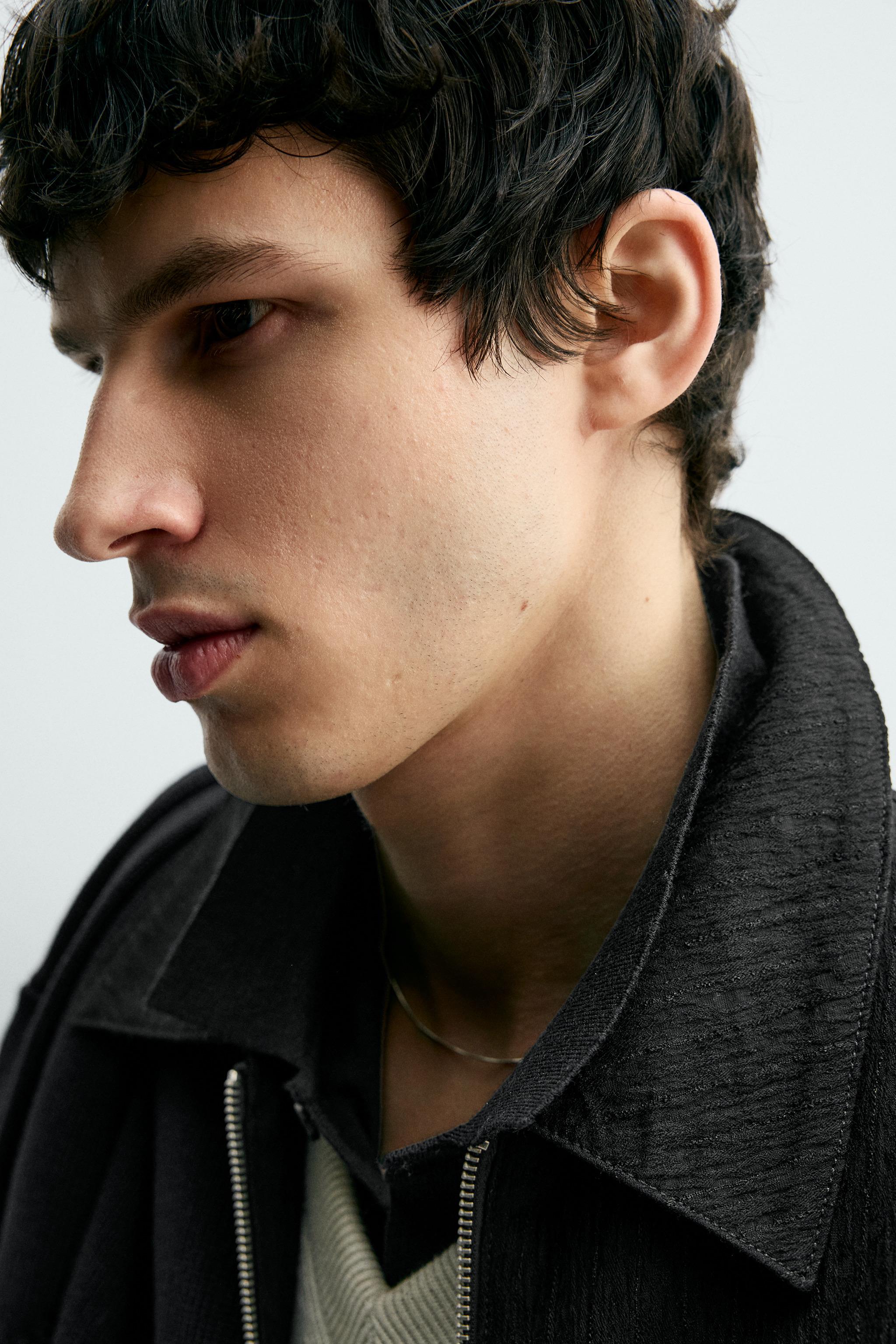 BLOUSON STRUCTURÉ IRRÉGULIER